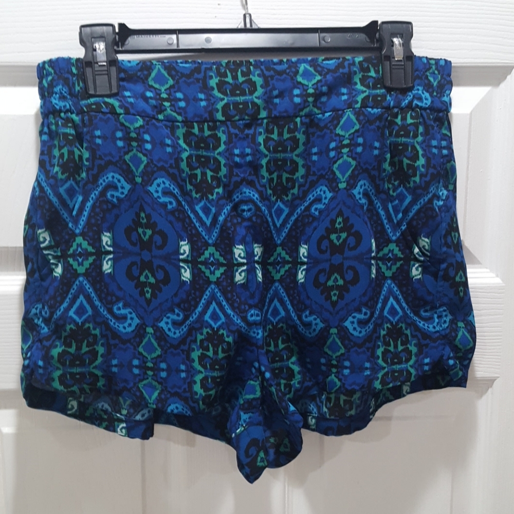 Express patterned dolphin shorts